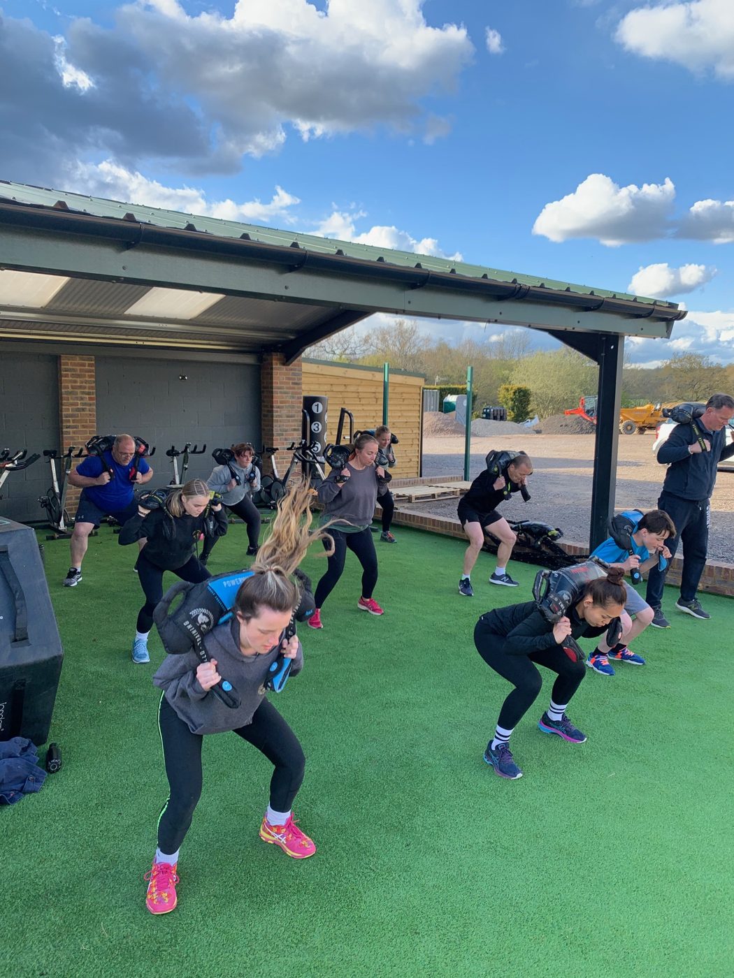 An outdoor class on the turf at Bodyworx
